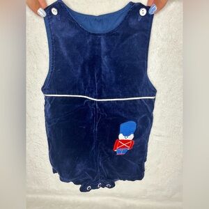 Vintage Navy Blue Infant Romper with Toy Soldier Design